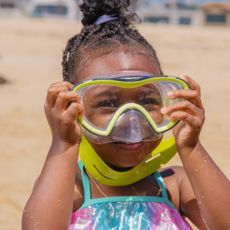 Happy child at the beach - beautiful smile